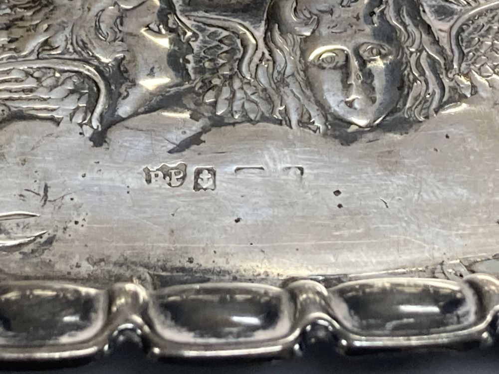 A George II silver meat skewer, John Harvey I, London, circa 1750, 28.5cm and an Edwardian silver Reynolds Angels pin tray,